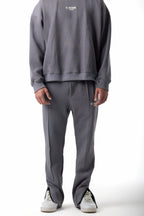 FRONT SEAM GREY ZIPPED SWEATPANTS