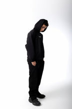 FRONT SEAM BLACK ZIPPED SWEATPANTS