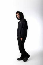 FRONT SEAM BLACK ZIPPED SWEATPANTS
