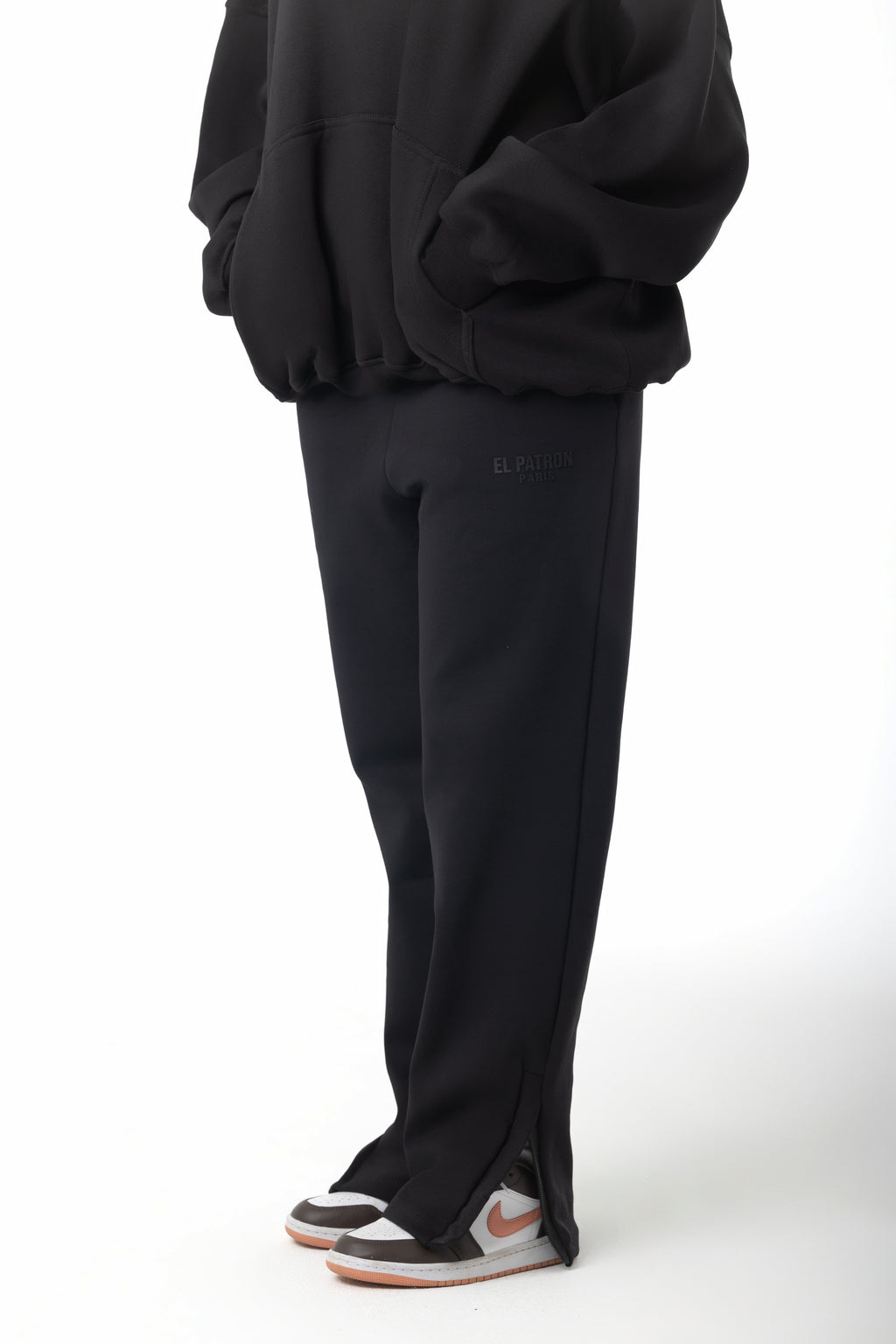 BLACK RELAXED FIT ZIPPED SWEATPANTS