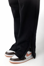 BLACK RELAXED FIT ZIPPED SWEATPANTS